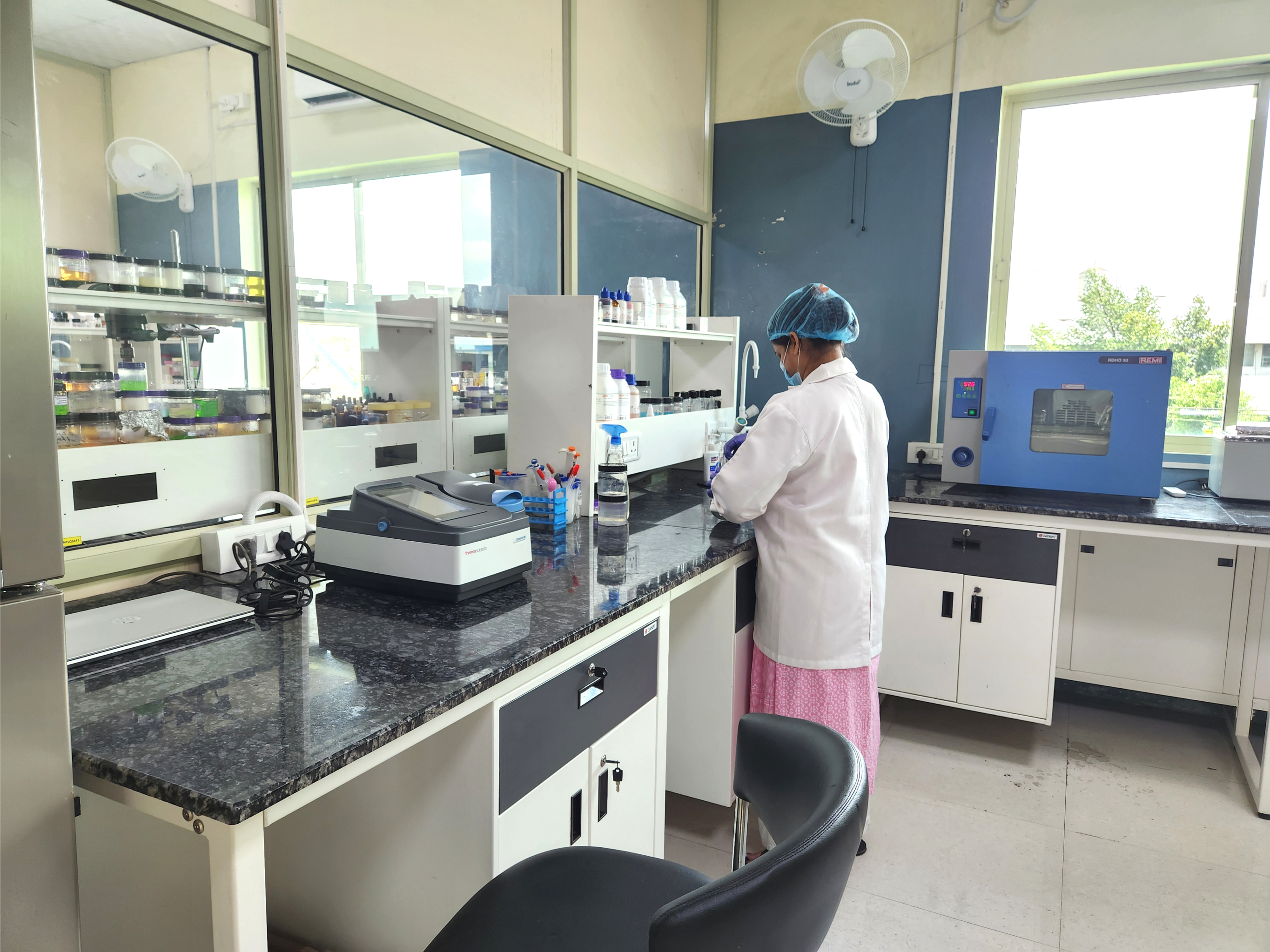Chemist working with instruments